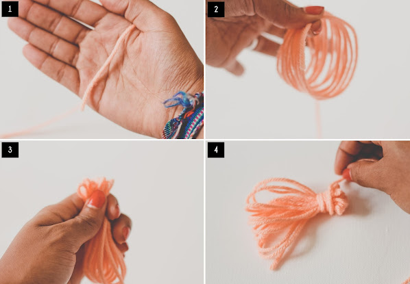 Wrap your gifts in an unconventional style with a gold chain and yarn tassel!